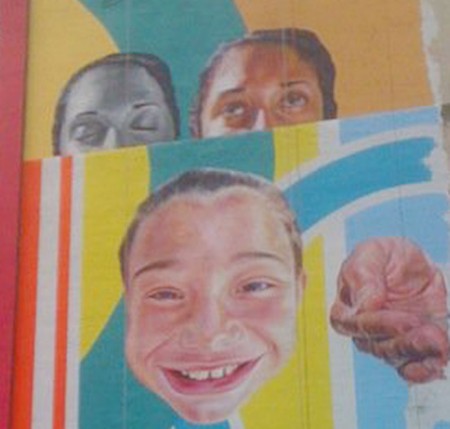 Pop Culture Paintings: The Kendall College mural features large contemporary pop culture and portraits. The paintings show real people from around the community. Photo courtesy of Terry Johnston Pop Culture Paintings: The Kendall College mural features large contemporary pop culture and portraits. The paintings show real people from around the community. Photo courtesy of Terry Johnston